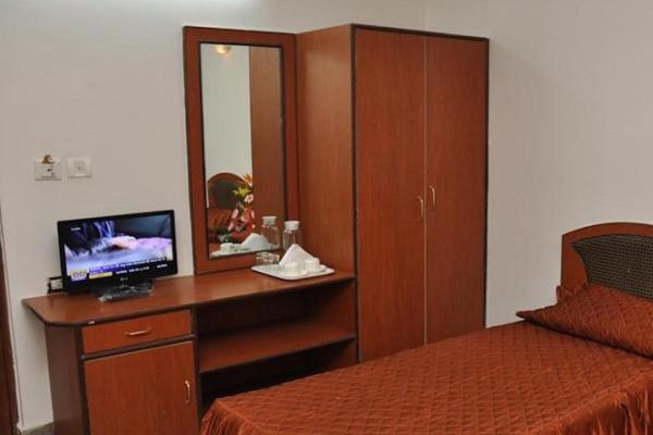 hotelpearlinn Bangalore Buitenkant foto
